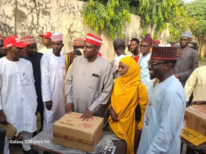 Distribution of Over 100 Sewing Machines to Women and Youth - Front View